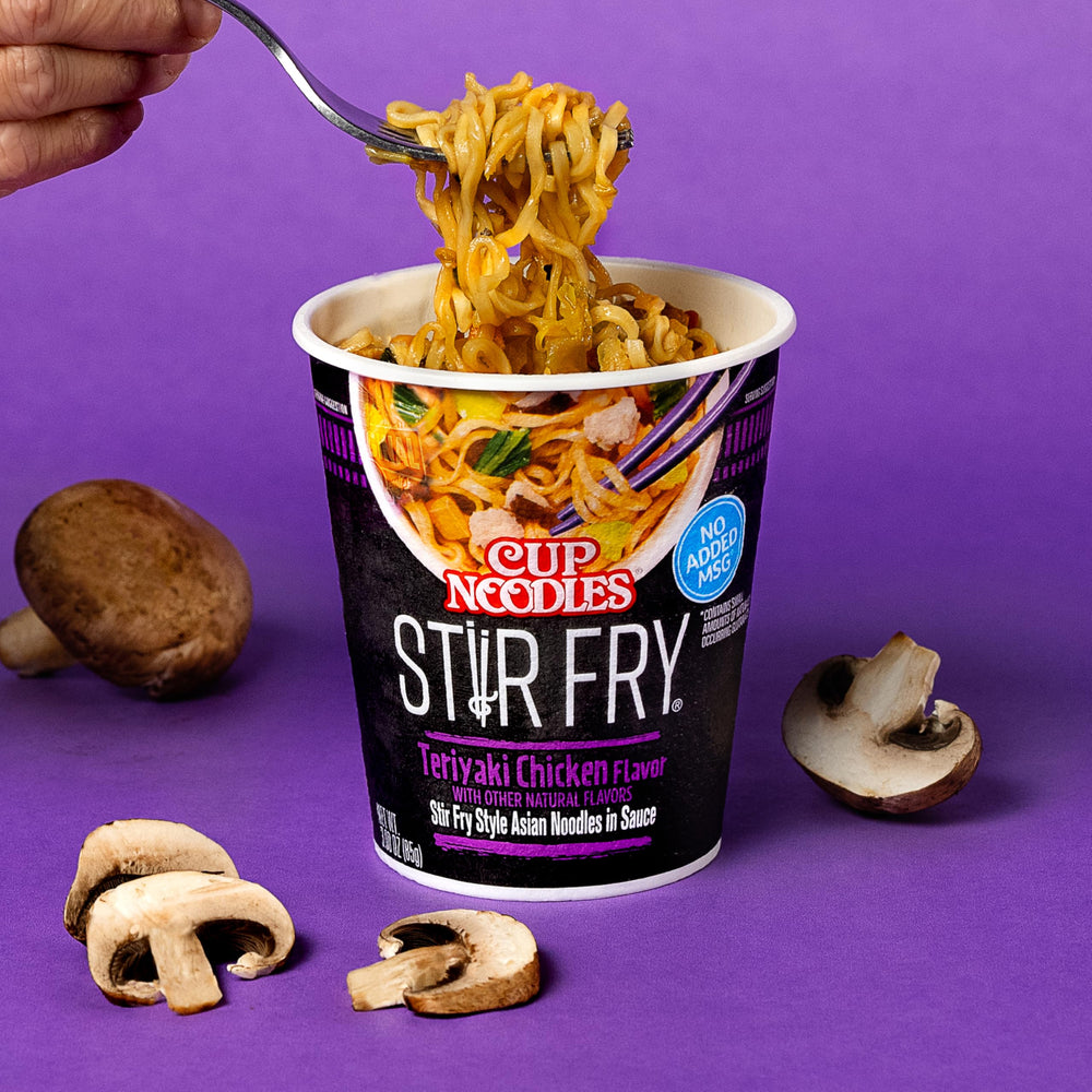 NISSIN Teriyaki sauce coats noodles for a rich, savory bite.
