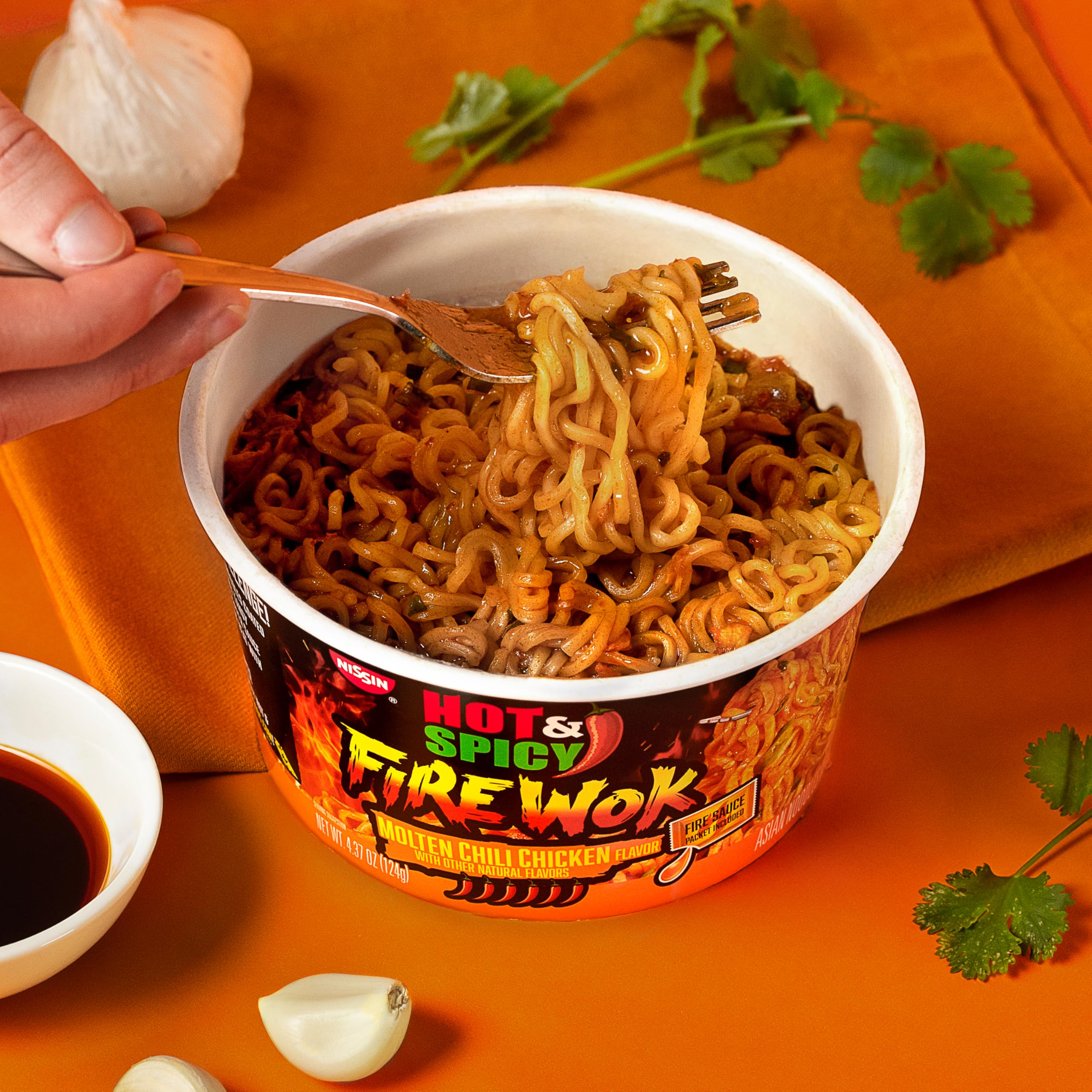 NISSIN Hot & Spicy Fire Wok noodles deliver chewy texture.