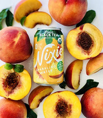 Nixie label close-up highlighting organic ingredients and peach black tea profile
