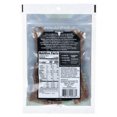 No Man's Land Dill Pickle Jerky slices close-up showing protein-packed lean beef.