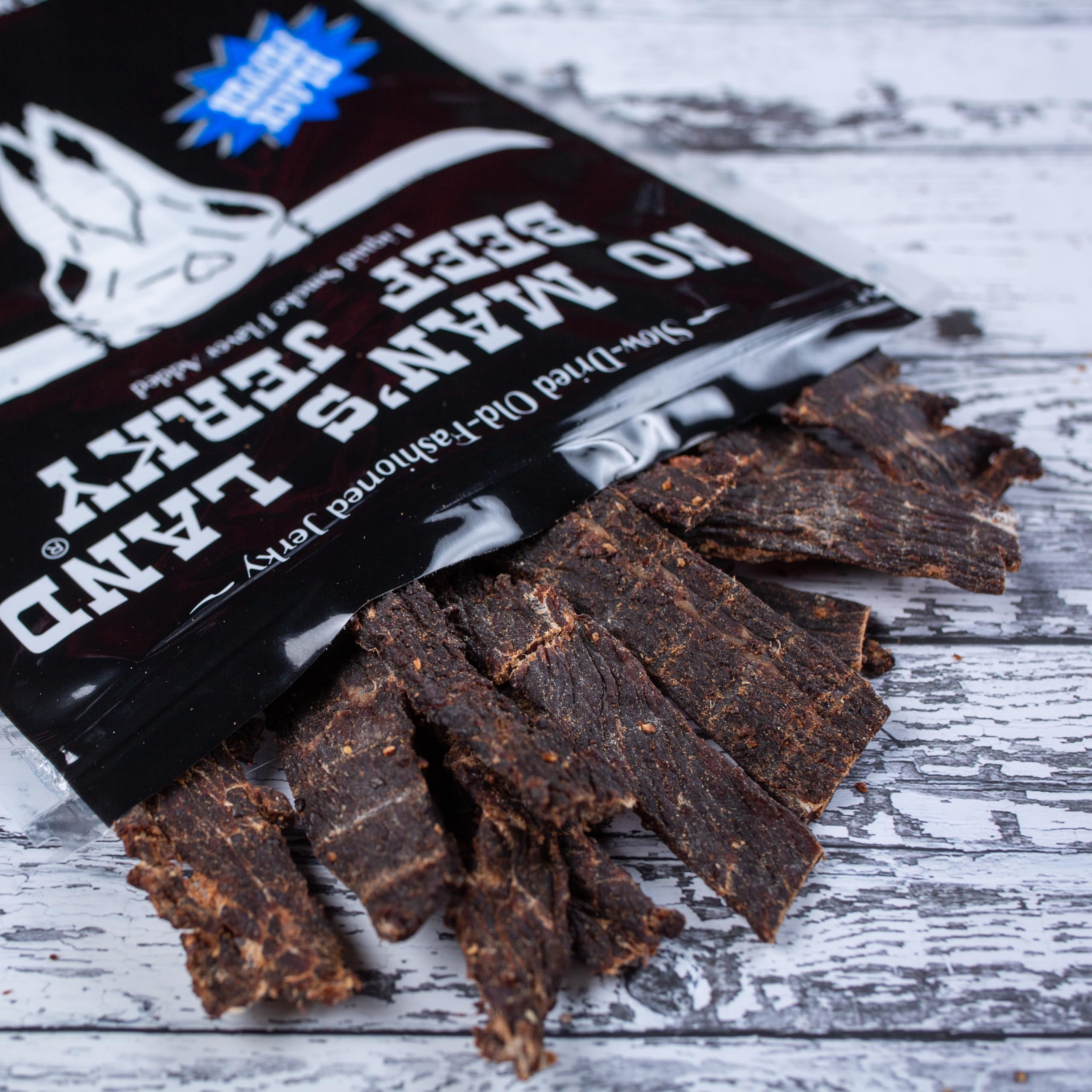 No Mans Land jerky bag open serving demonstrates convenient grab-and-go snack