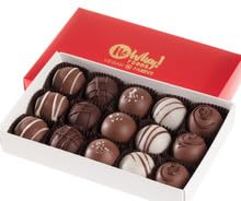 No Whey! Foods Signature Holiday Truffles in red box close-up, vegan and dairy-free indulgence.
