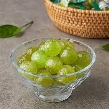 Noble Phoenix Grapes Hard Candy setup on a festive party table.