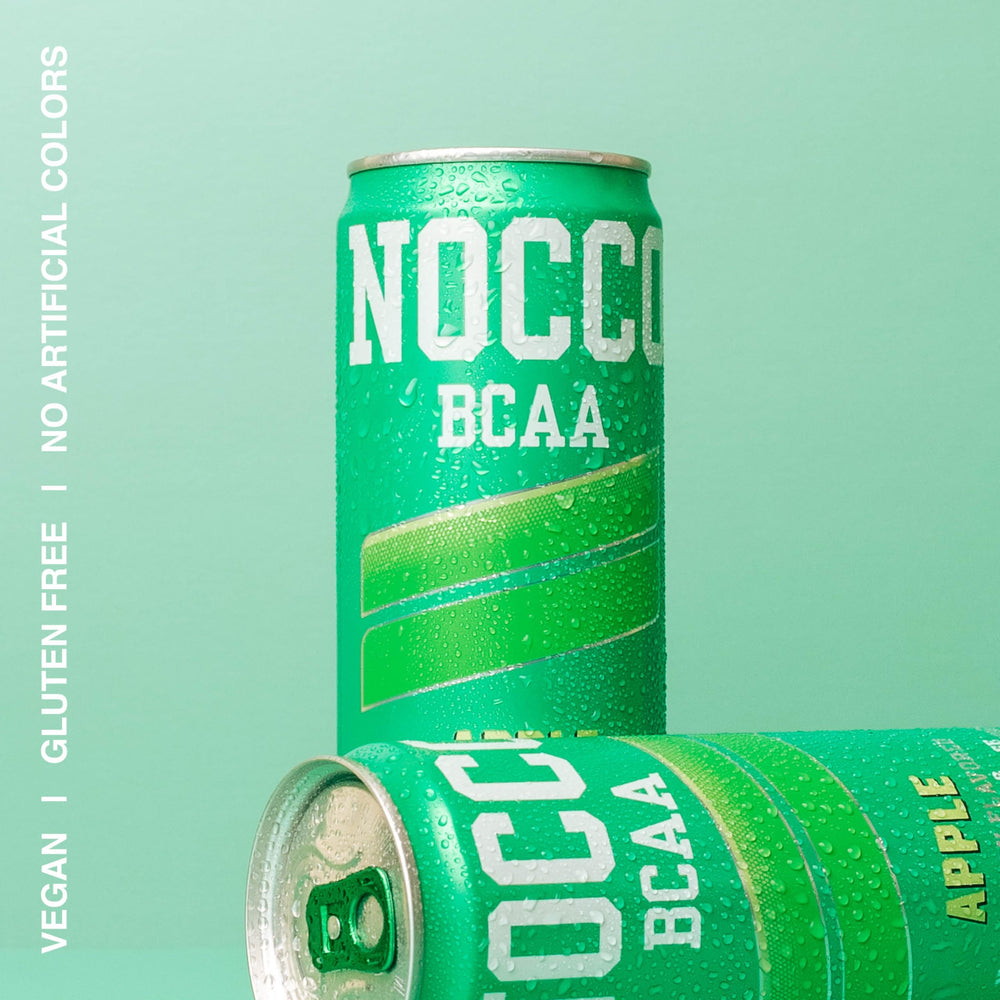 NOCCO Apple can being poured into a glass to showcase carbonation and flavor.