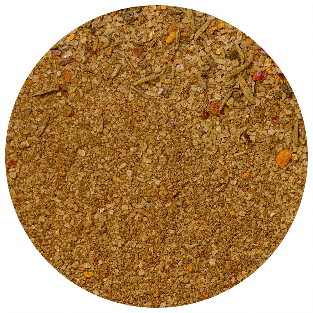 Nom Nom Paleo Magic Mushroom Seasoning Powder on a kitchen counter ready for flavor