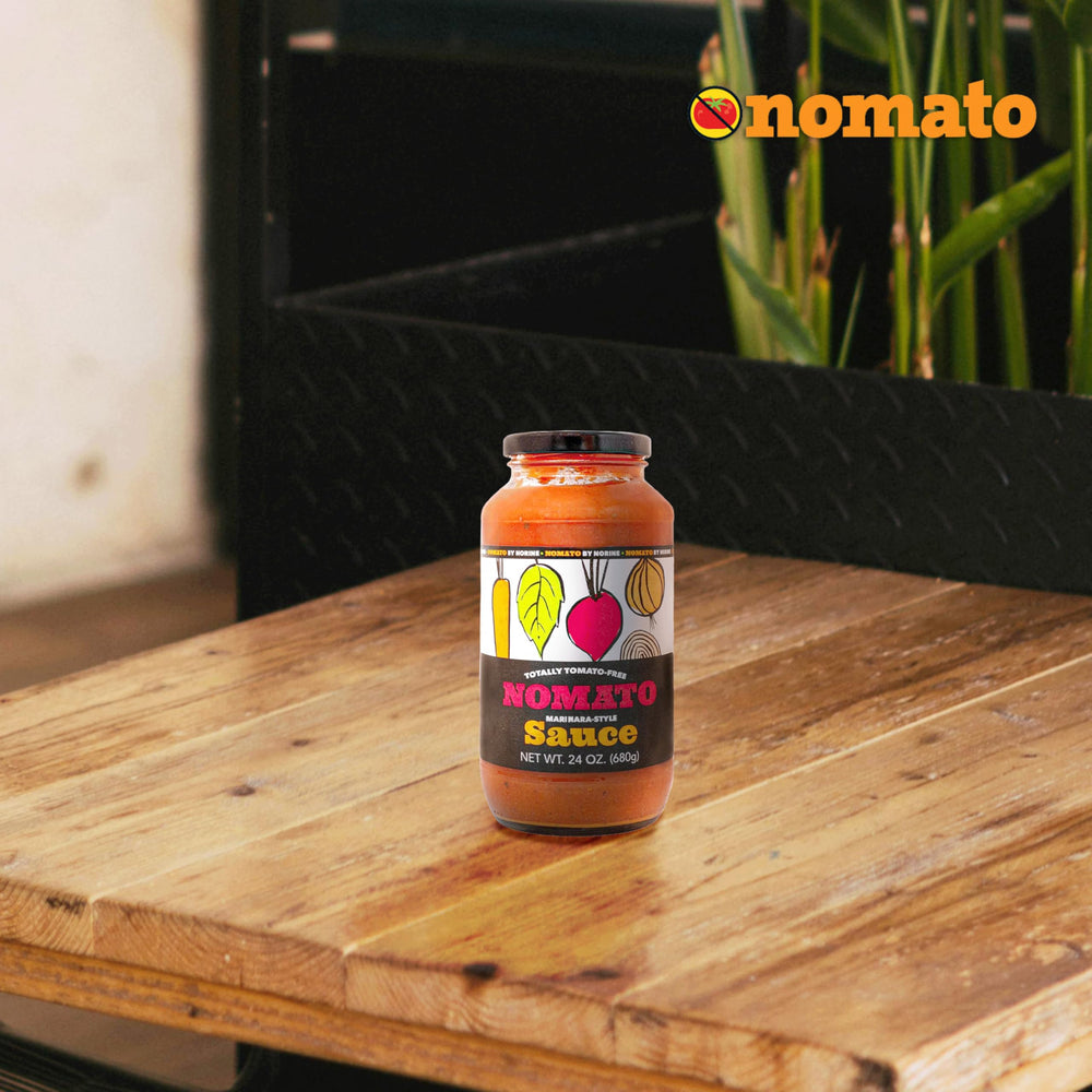 Nomato Original tomato-free marinara tasting sample, showcasing versatile uses on beans or meats.
