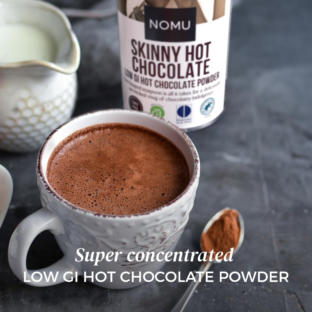 NOMU Skinny hot chocolate cup steaming for a cozy, low-calorie indulgence.