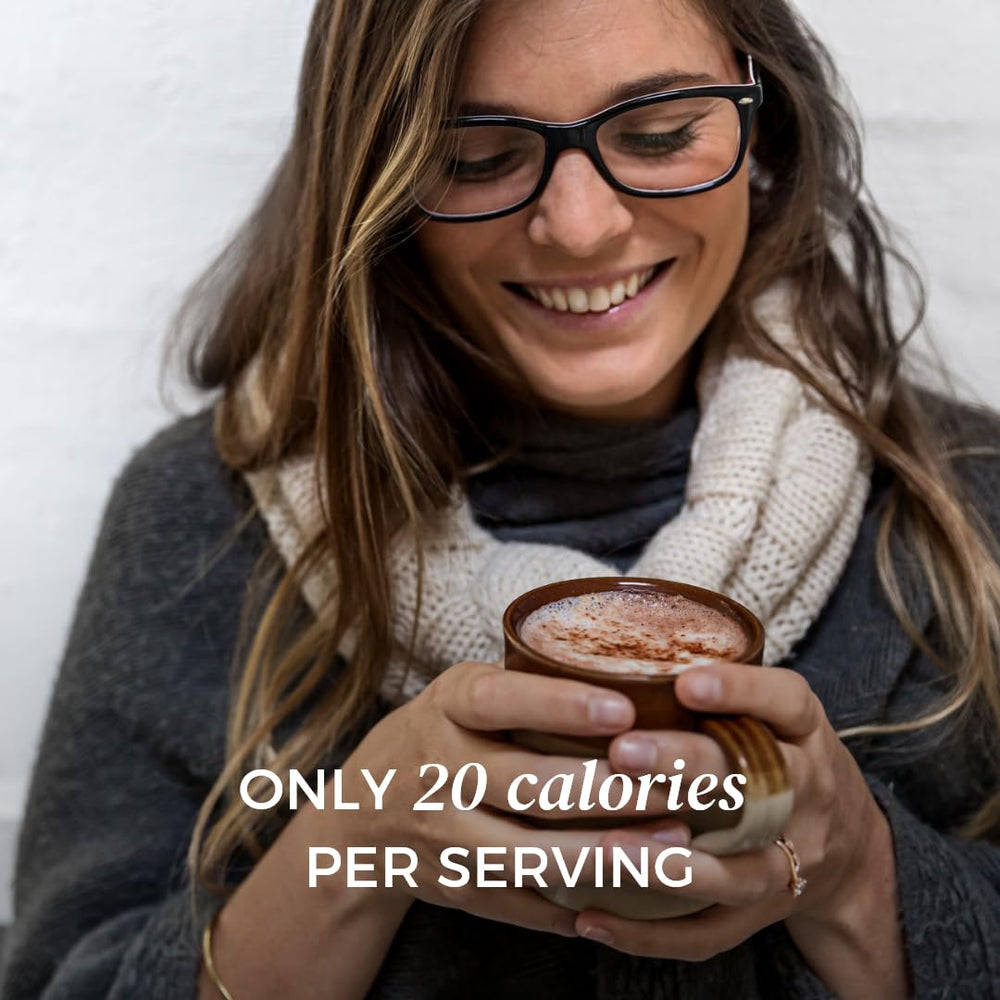 NOMU Skinny hot chocolate dry mix dispensing shows easy, quick keto-friendly preparation.