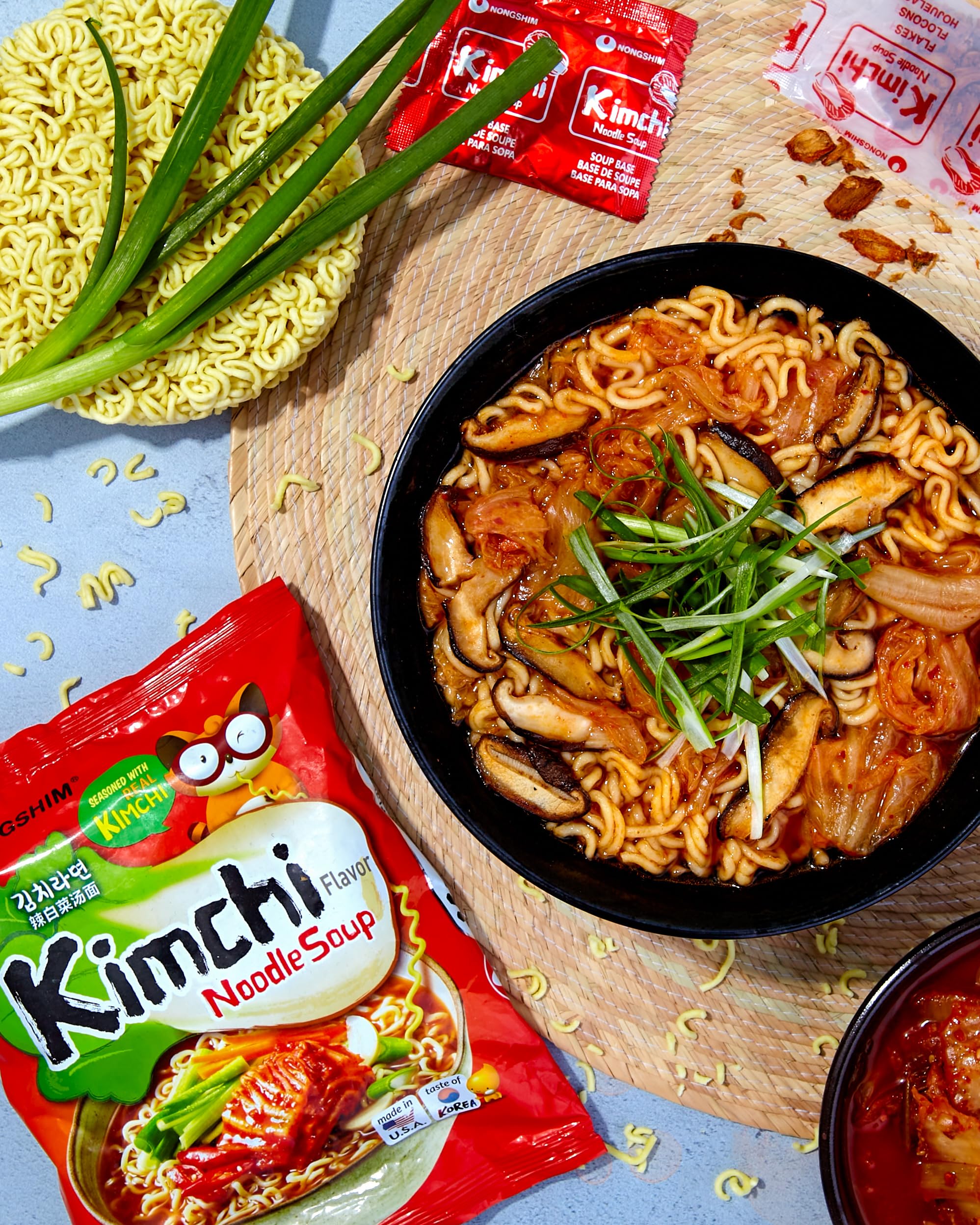 Nongshim ramen steaming in a bowl signals a comforting ready-to-eat meal.