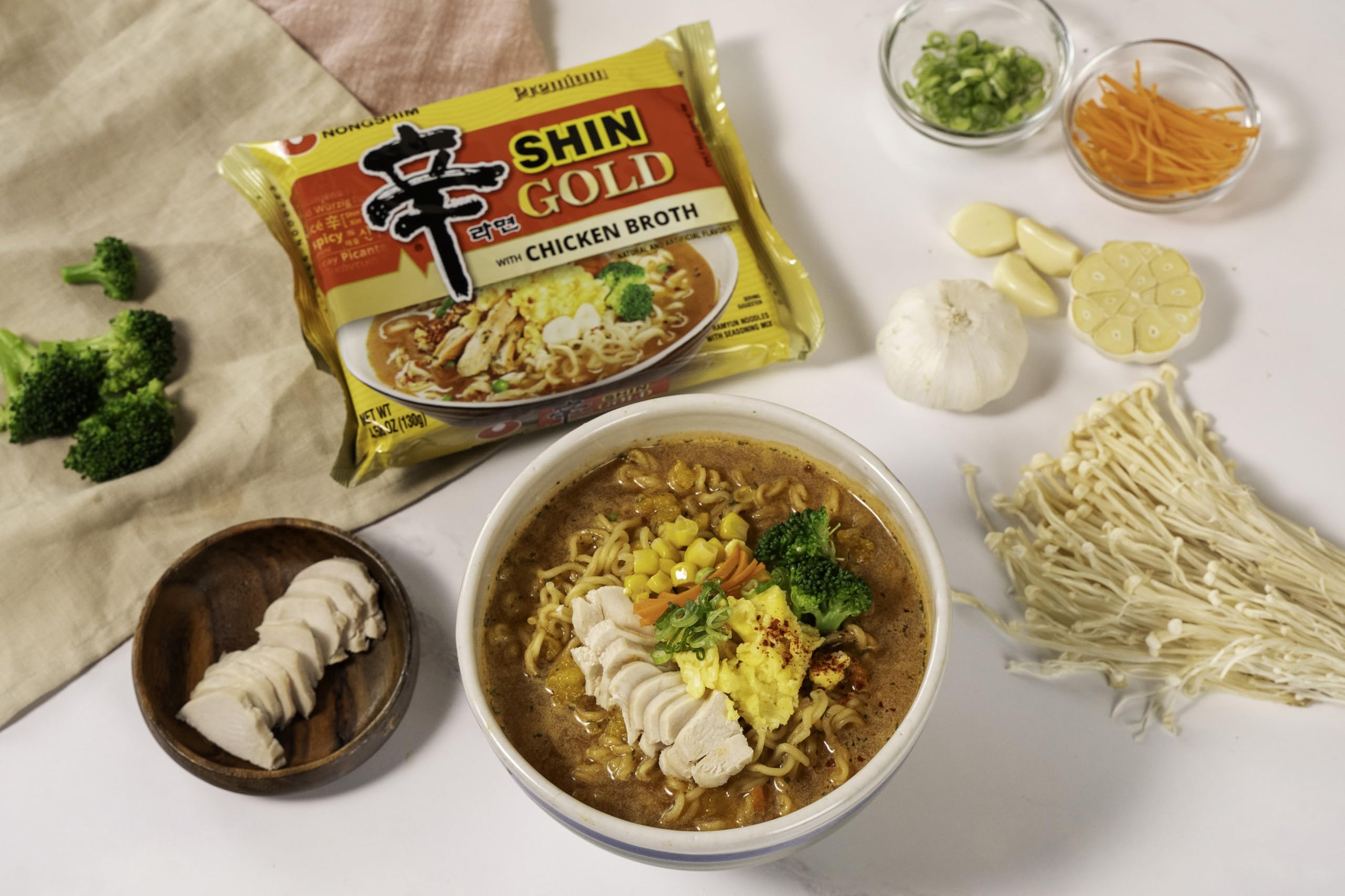 Nongshim Shin Gold chicken-broth-base creates a comforting soup base.
