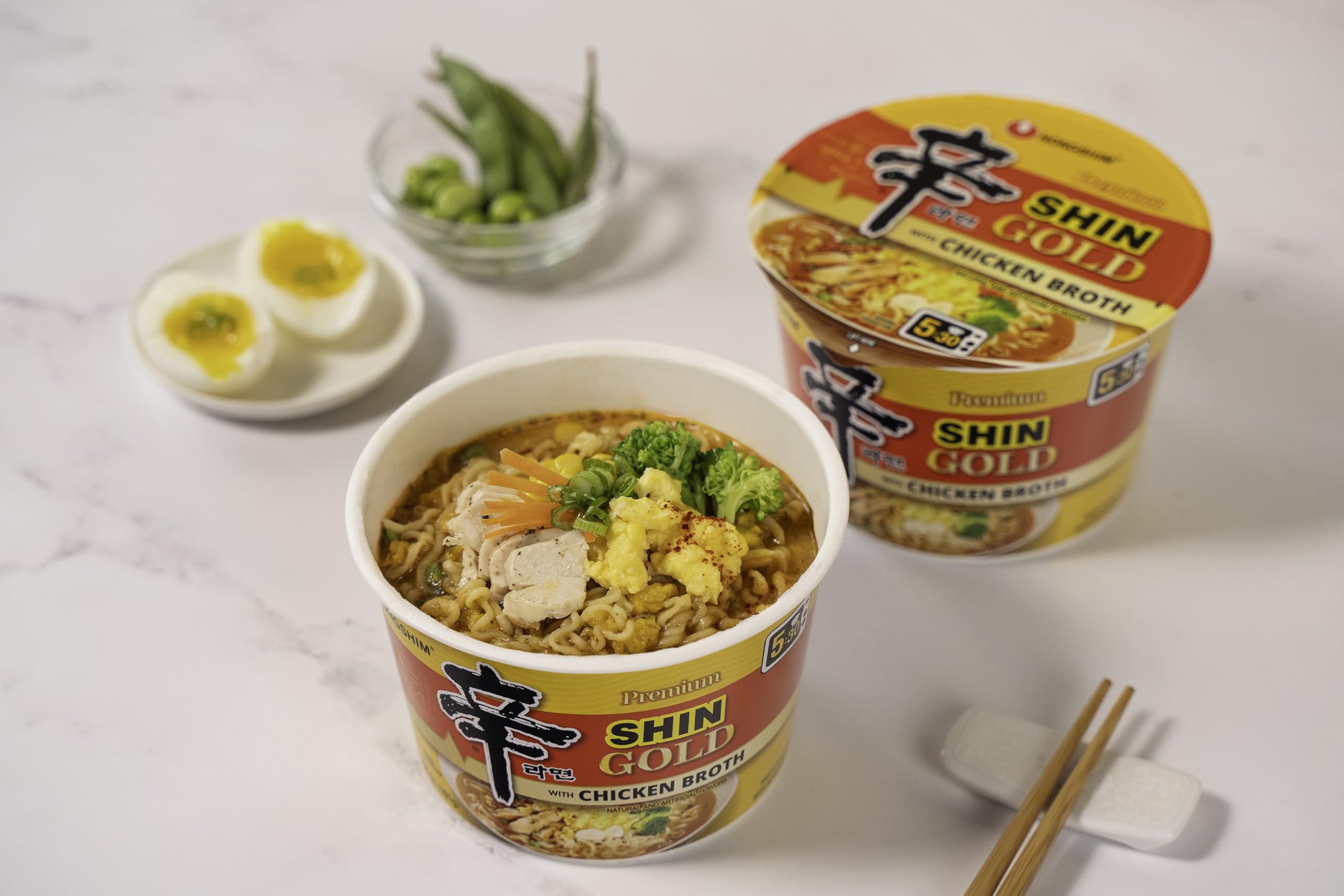 Nongshim Shin Gold chicken broth and spices add aromatic depth