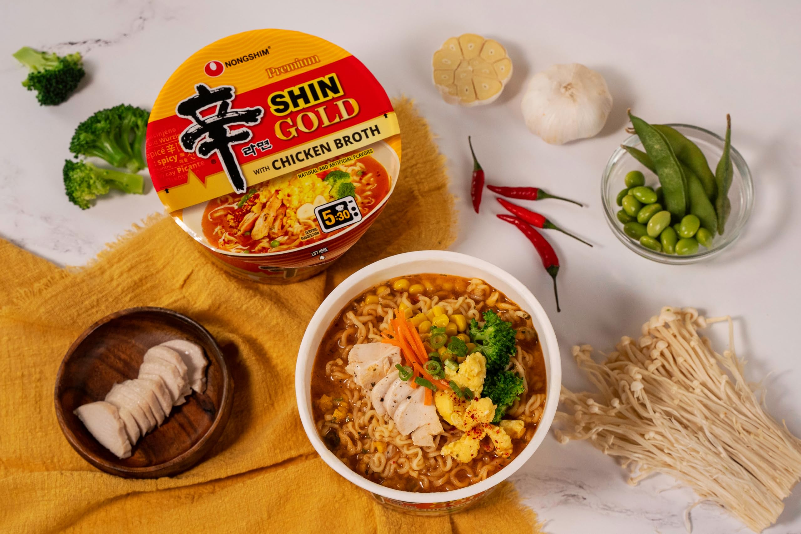 Nongshim Shin Gold sauce with vegetables pack enriches broth with texture