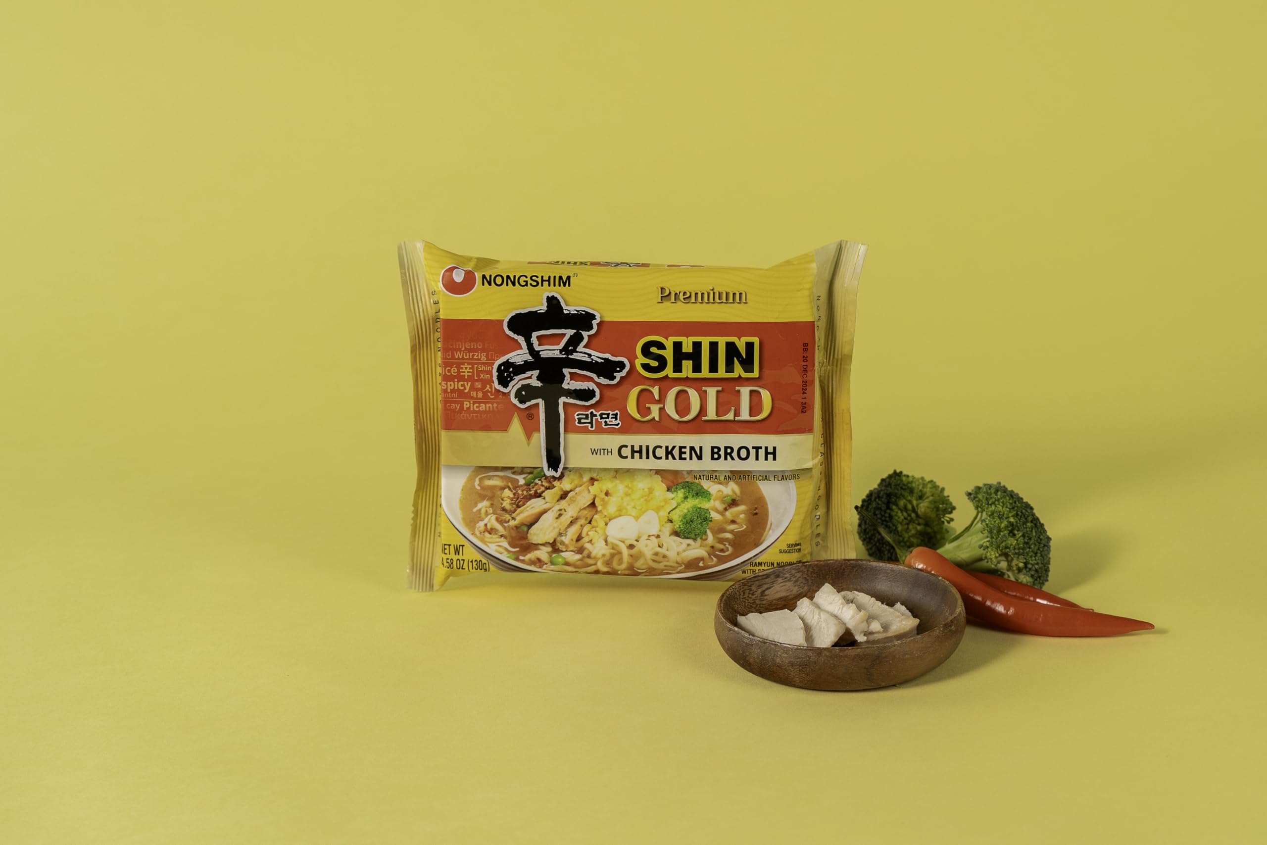 Nongshim Shin Gold serving-bowl scene showcases a hot, inviting ramen.