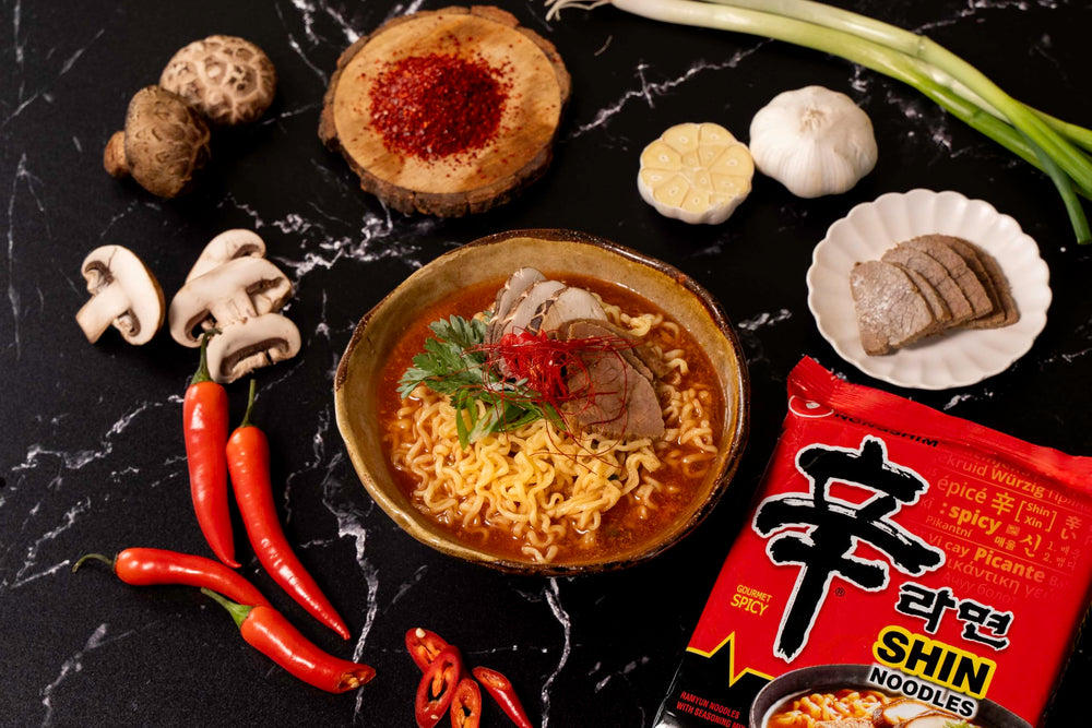 Enjoy a customizable bowl by adding kimchi, cheese, or extra noodles.