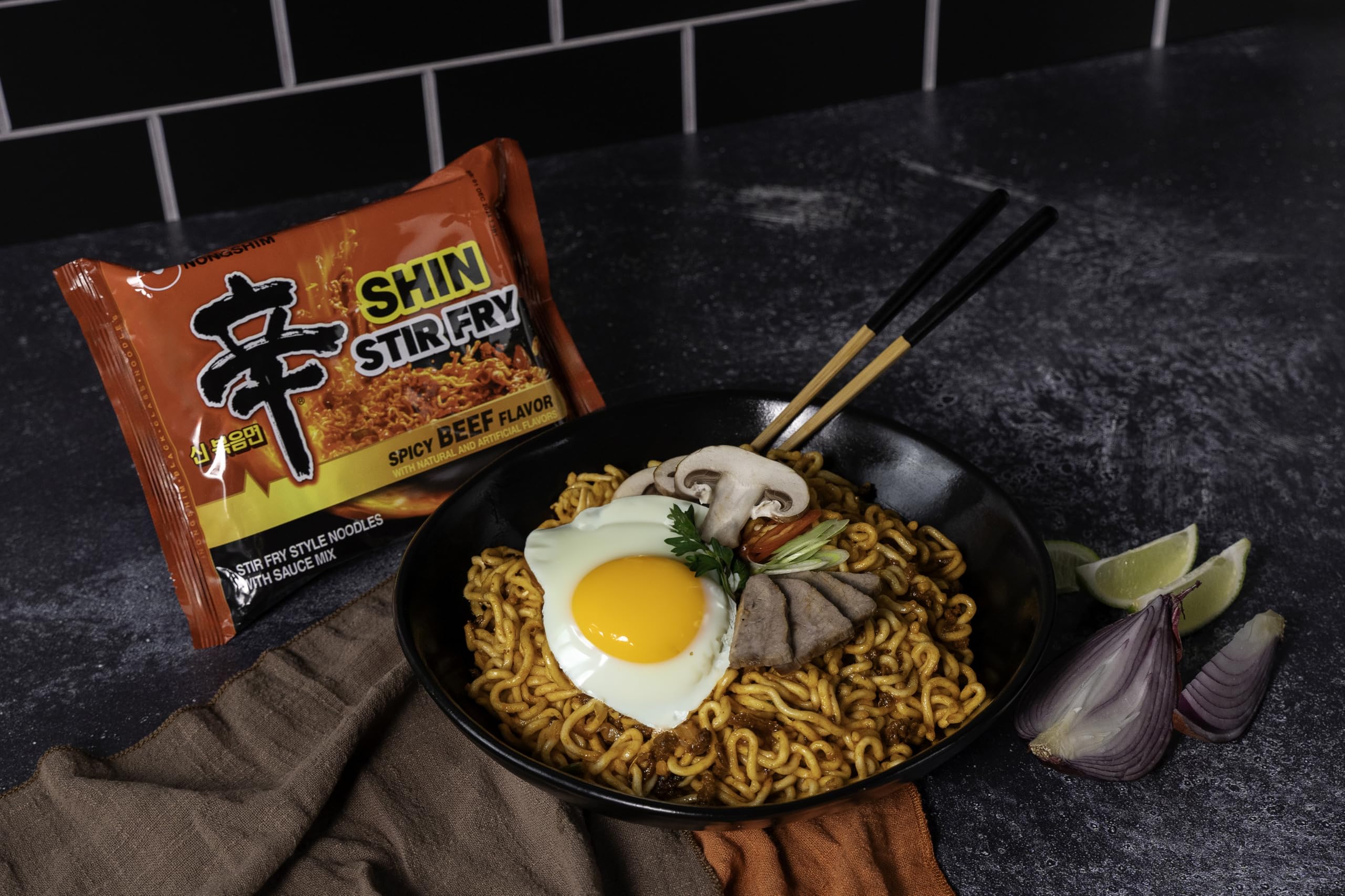 Nongshim Shin Ramyun Stir-Fry Square Bowl steaming, inviting ready-to-eat meal for quick gratification.