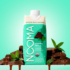 NOOMA Organic Electrolyte chocolate mint pour into glass for quick hydration
