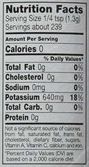 NoSalt Original sodium-free salt shaker closeup shows grain texture for cooking.