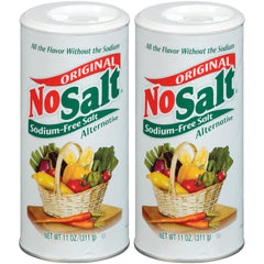 NoSalt salt substitute bottle pour demonstrates sodium-free seasoning for healthier meals.