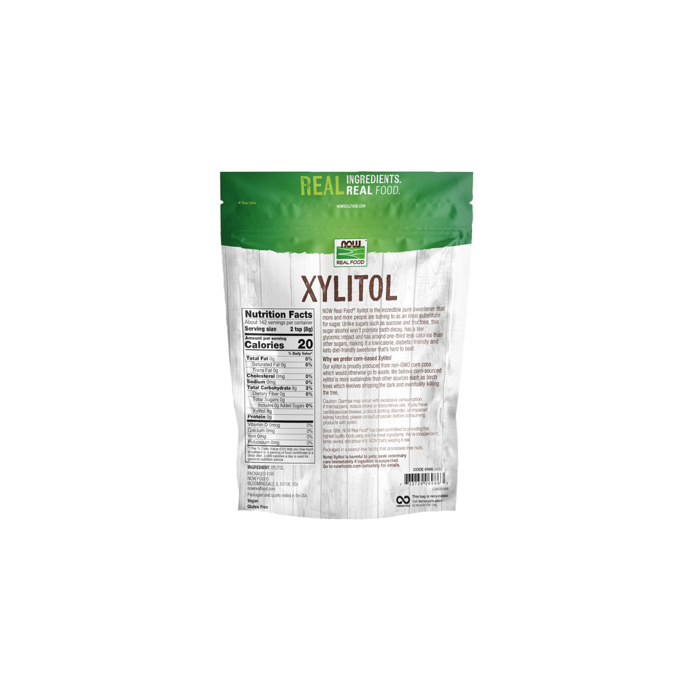 NOW Foods Xylitol pour bottle demonstrates easy measuring for sugar-free beverages.