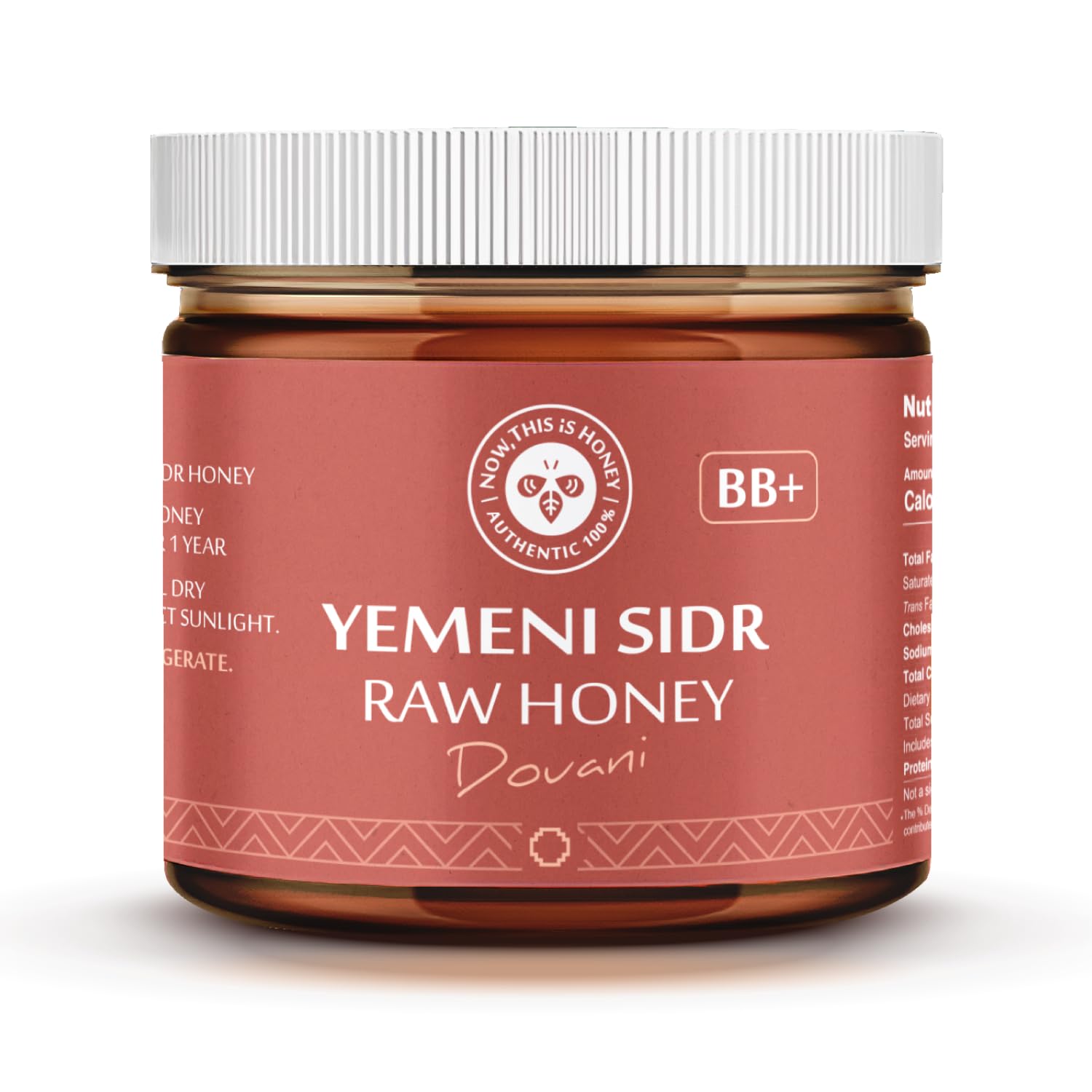 Now This Is Honey Glass jar on wood table signals premium packaging.