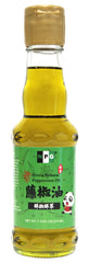 Natural Plus Green NPG Sichuan green peppercorn oil bottle enhances stir-fries with authentic heat.