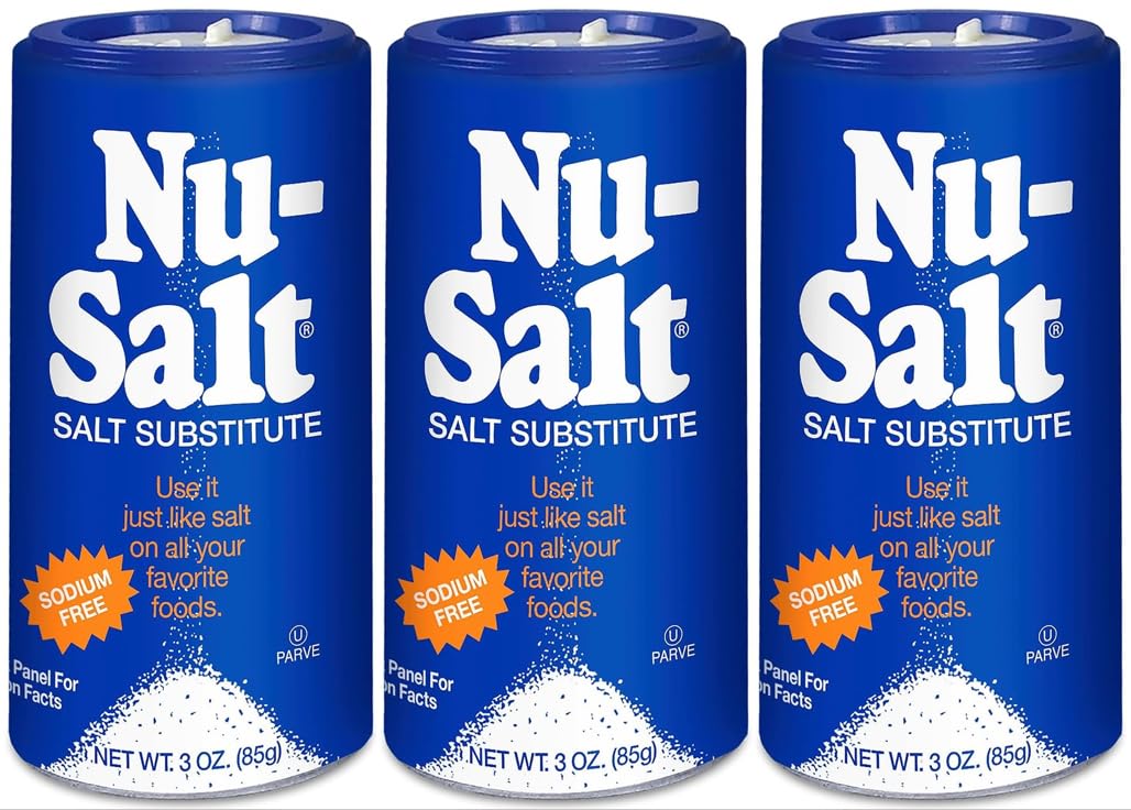 NU-SALT balance bottle pour demonstrates a sodium-free seasoning for everyday meals.