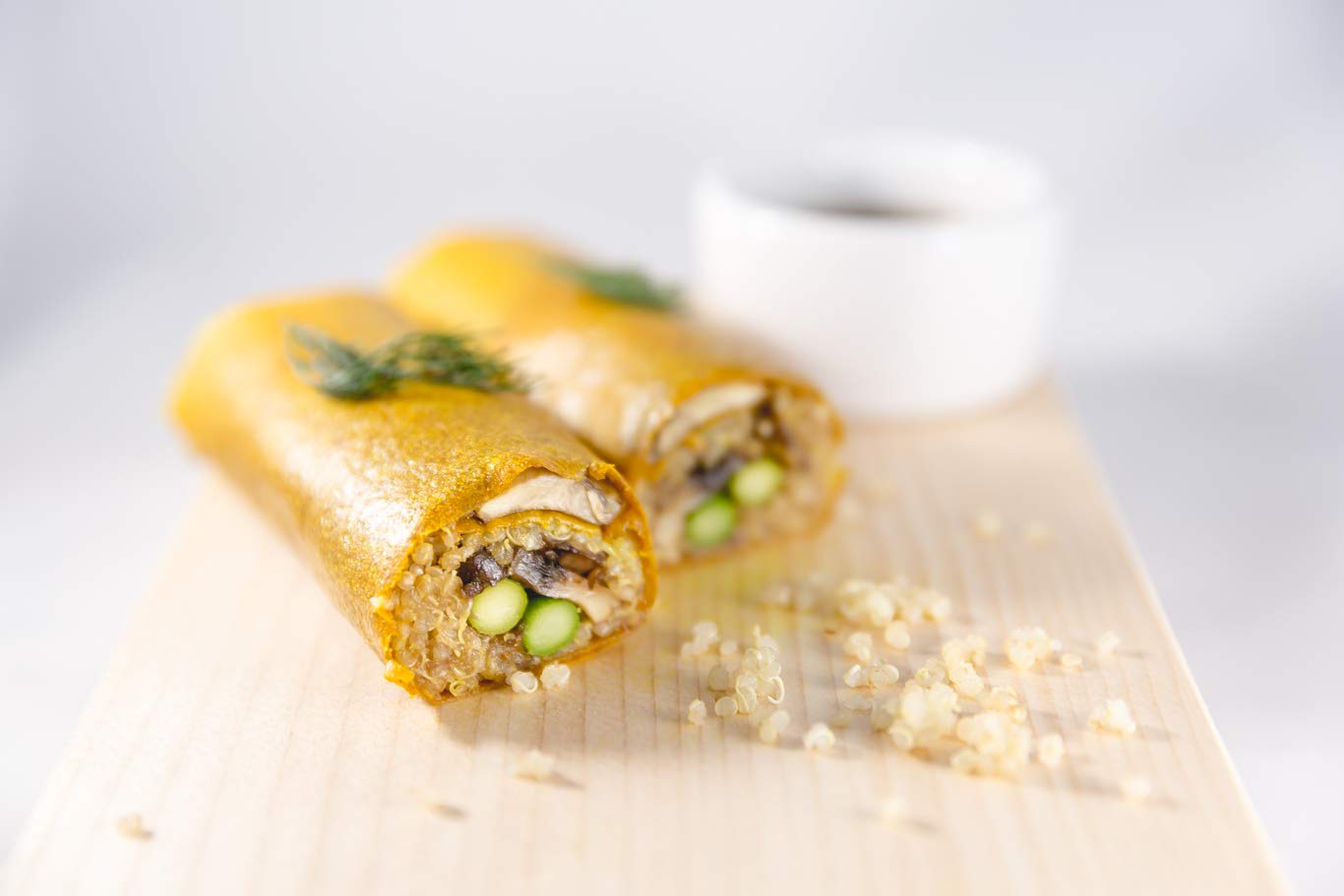 NUCO turmeric coconut wrap sliced to show texture and turmeric aroma.