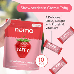 Numa Taffy close-up texture highlights chewy strawberry cream bite.
