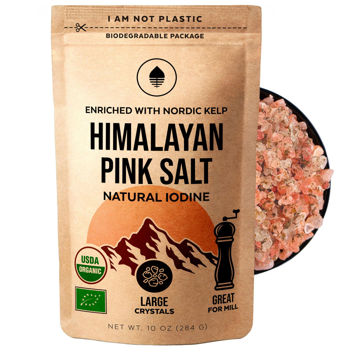 Numami Himalayan Pink Salt with Nordic Kelp in a spoon for enhanced flavor and iodine-rich seasoning.