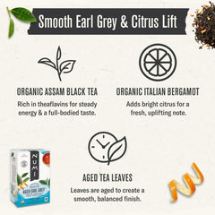 Numi full-leaf tea bag opening releases balanced flavor gently.