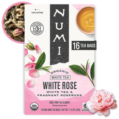 Numi White Rose Tea bag on a table with soft steam, gentle moment