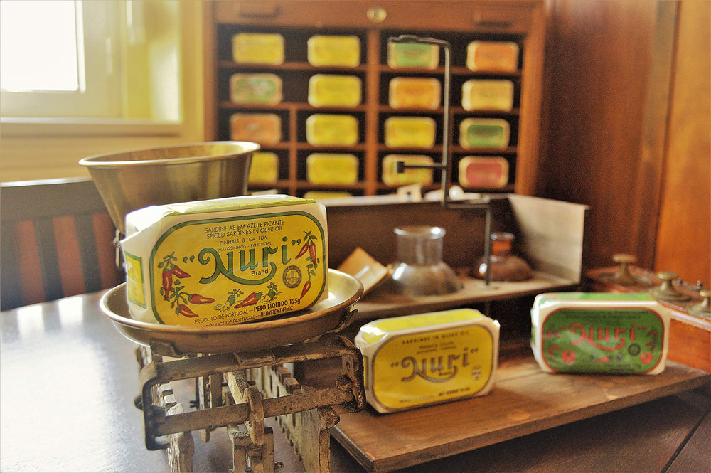 Nuri hand-wrapped vintage-design can, a premium gift-ready seafood experience.