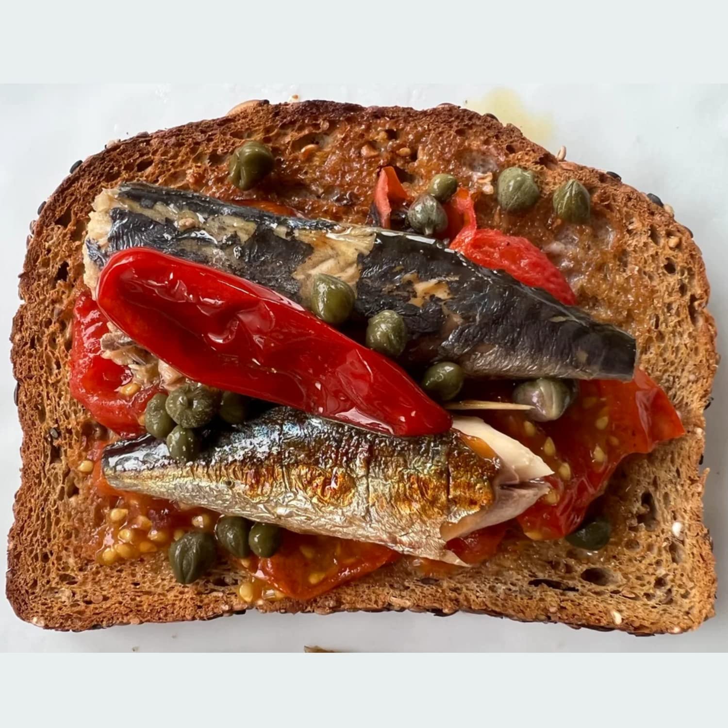 Nuri Mackerel Spiced in Olive Oil four-pack ideal for pantry and gifting.