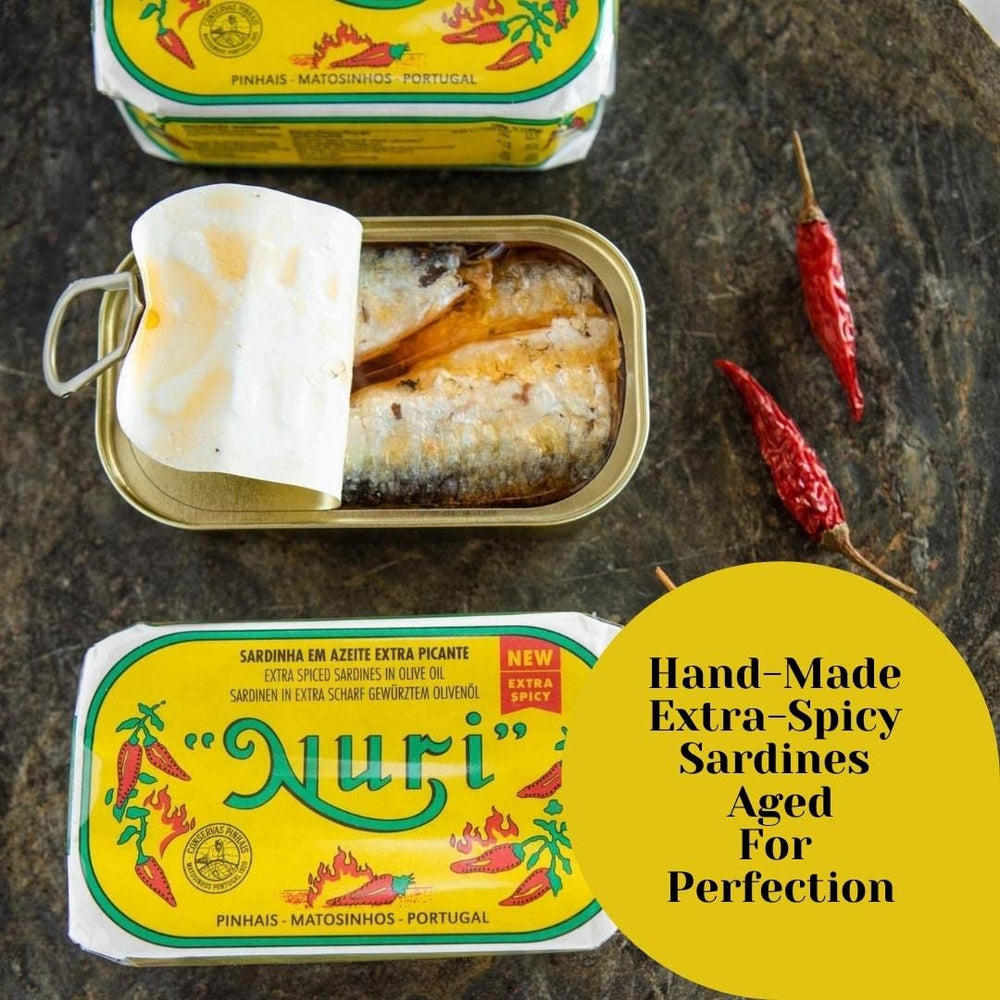 Nuri sardines in spicy olive oil pantry staple for Mediterranean-inspired snacks.