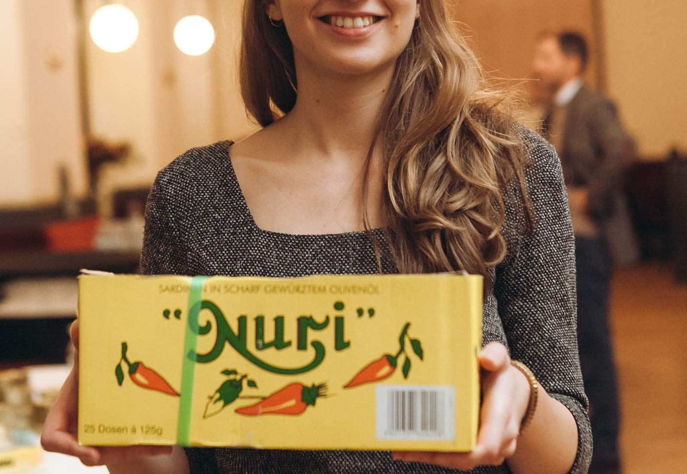Gift packaging presents Nuri sardines as a luxurious culinary gift.