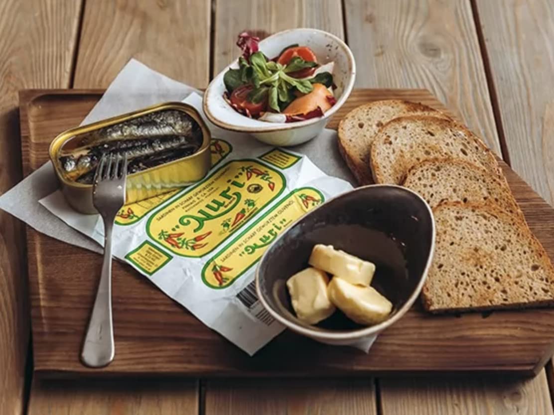 Nuri sardines on bread toast for a simple, satisfying snack.