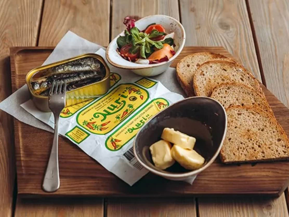 Nuri sardines on bread toast for a simple, satisfying snack.