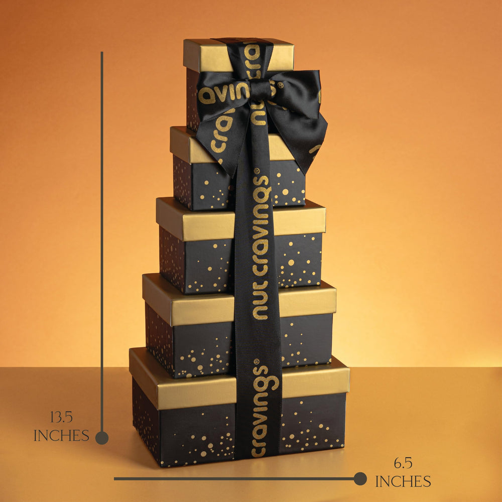 Nut Cravings 5-tier gift tower with gold ribbon elevates any special occasion.