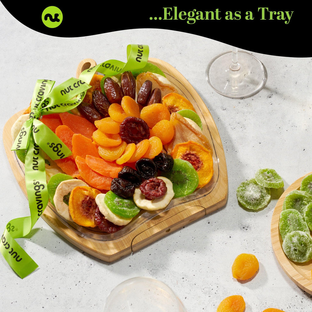Nut Cravings fruit snack display on wooden tray for easy snacking.