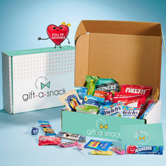 Nut Cravings Gift A Snack variety pack on display, ideal for celebrations and sharing.