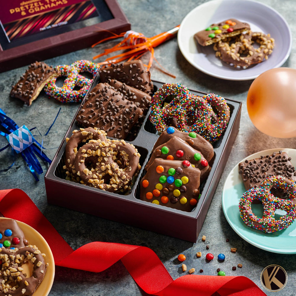 Nut Cravings KREMERY assorted treats in the four-compartment box.