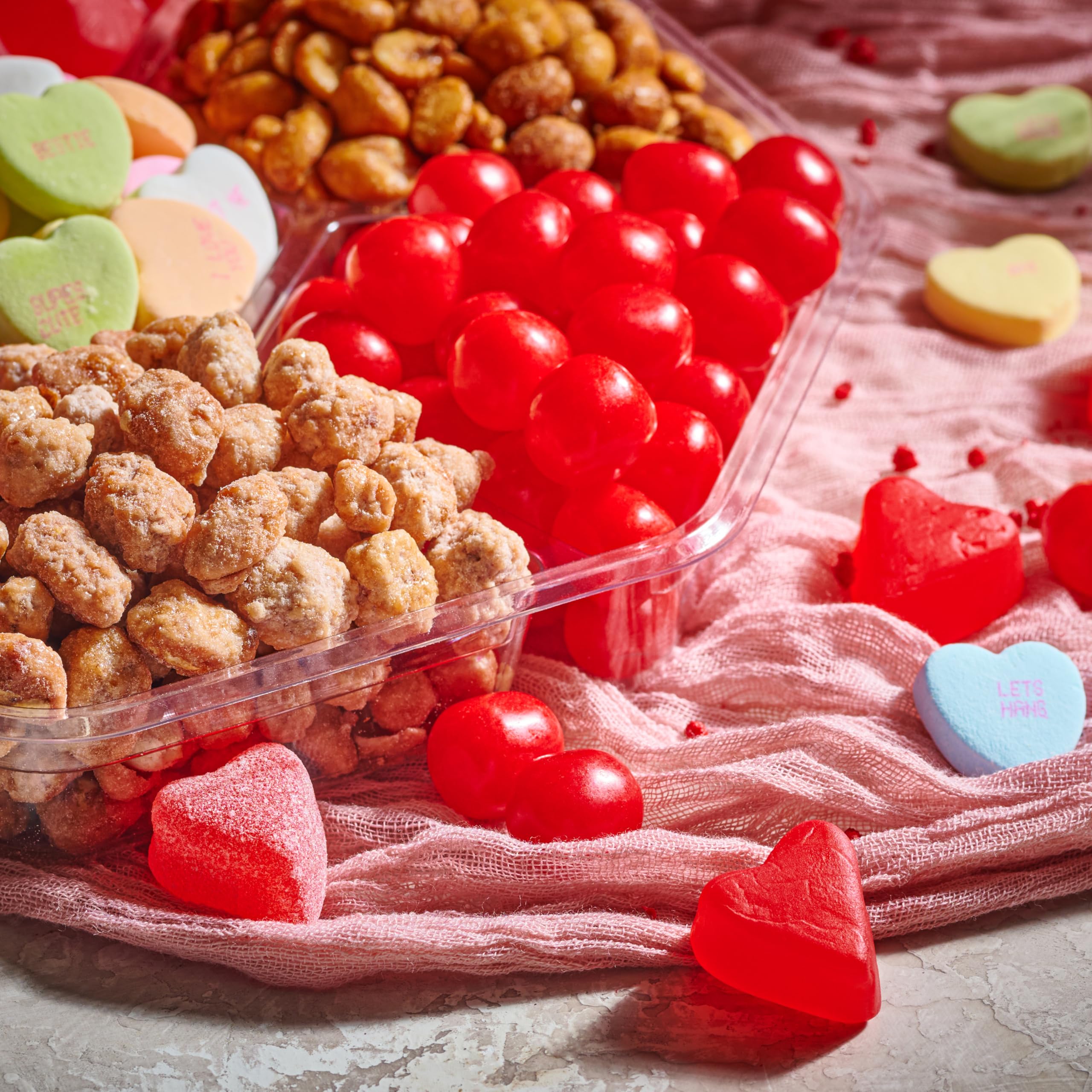 Nut Cravings premium packaging with clear window showing treats