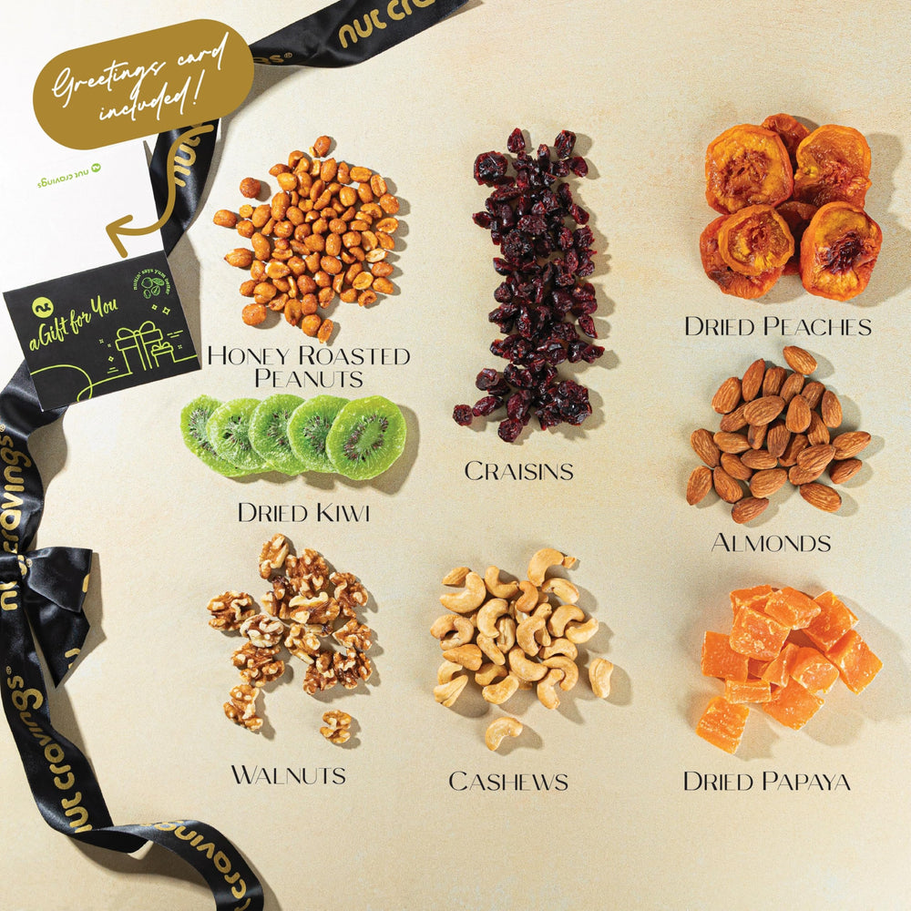 Nut Cravings snack tower celebration showcases premium nuts and fruits for sharing.