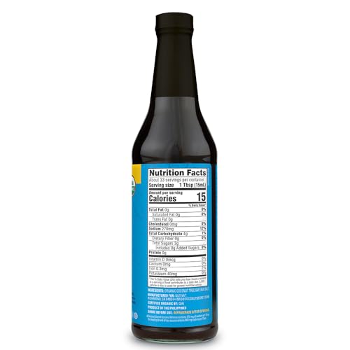Close-up of Nutiva Coconut Aminos glass bottle and label with glass sheen