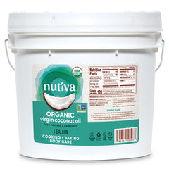 Nutiva organic coconut oil bottle on counter for versatile cooking.