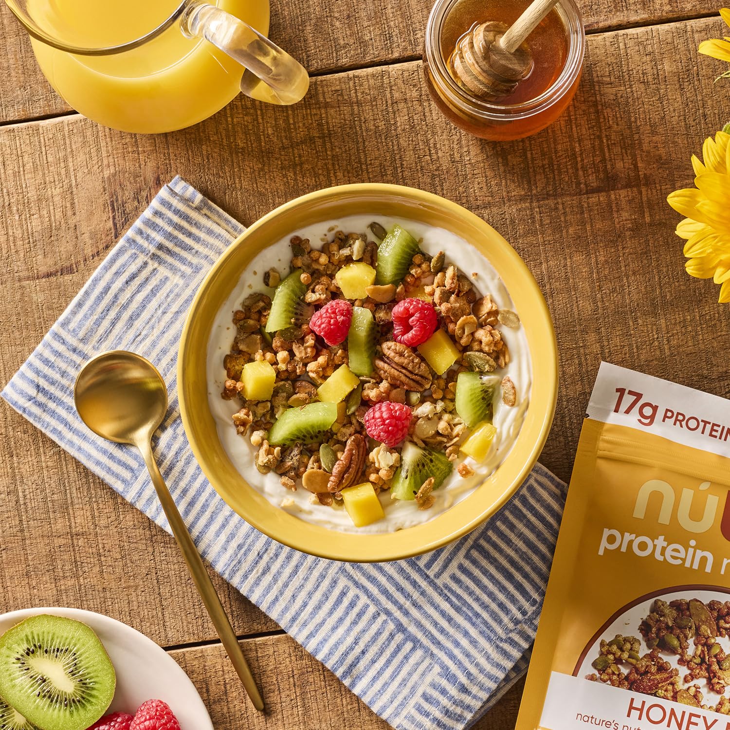 NuTrail granola being poured into a bowl for breakfast.