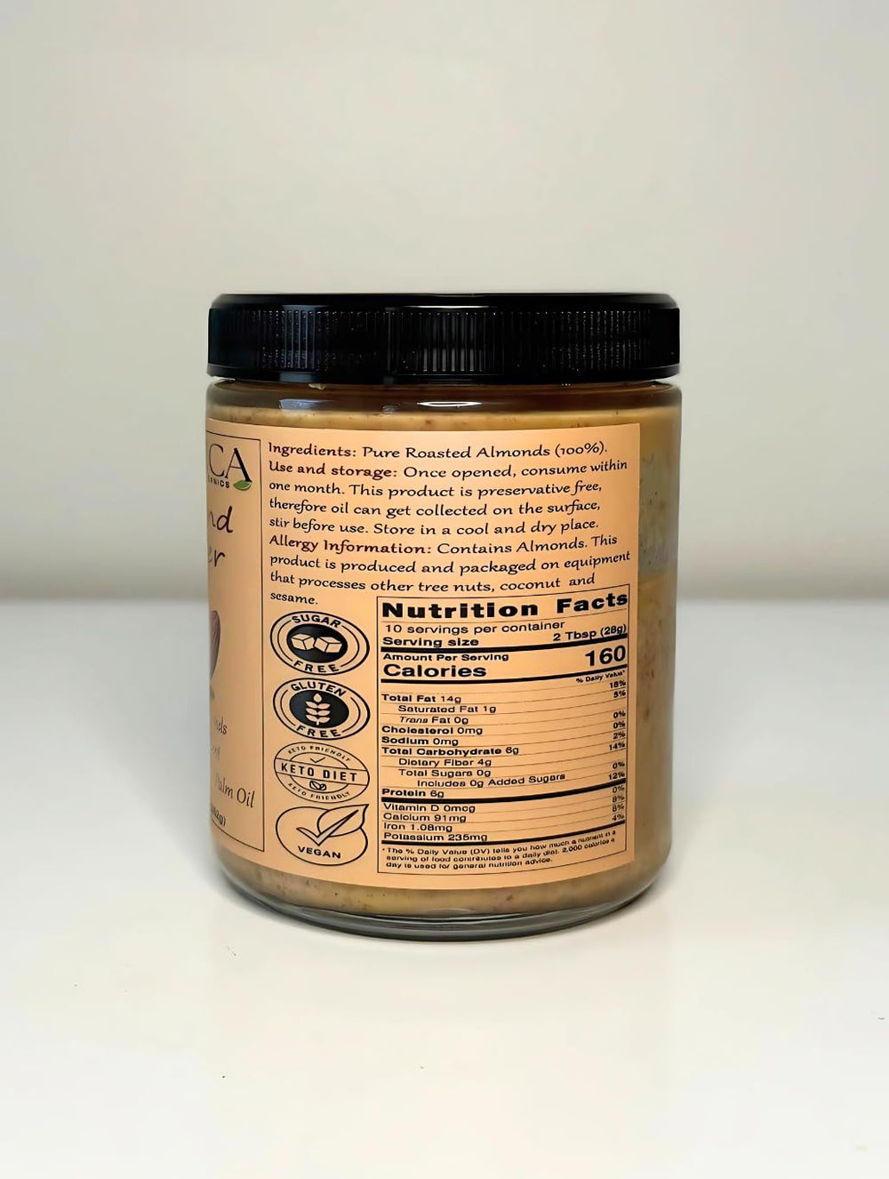 Nutrica Organics almond butter jar open, creamy texture ready to scoop