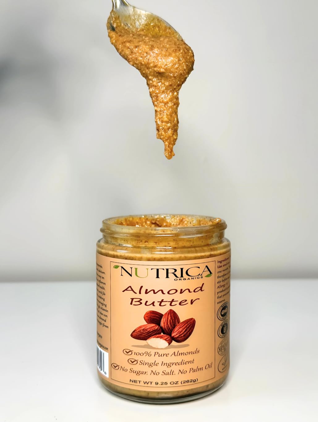 Nutrica Organics almond butter on kitchen counter, versatile pantry staple