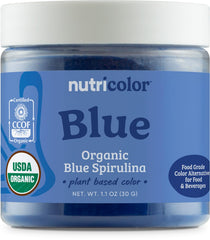 Nutricolor blue spirulina powder in bottle showing vibrant color