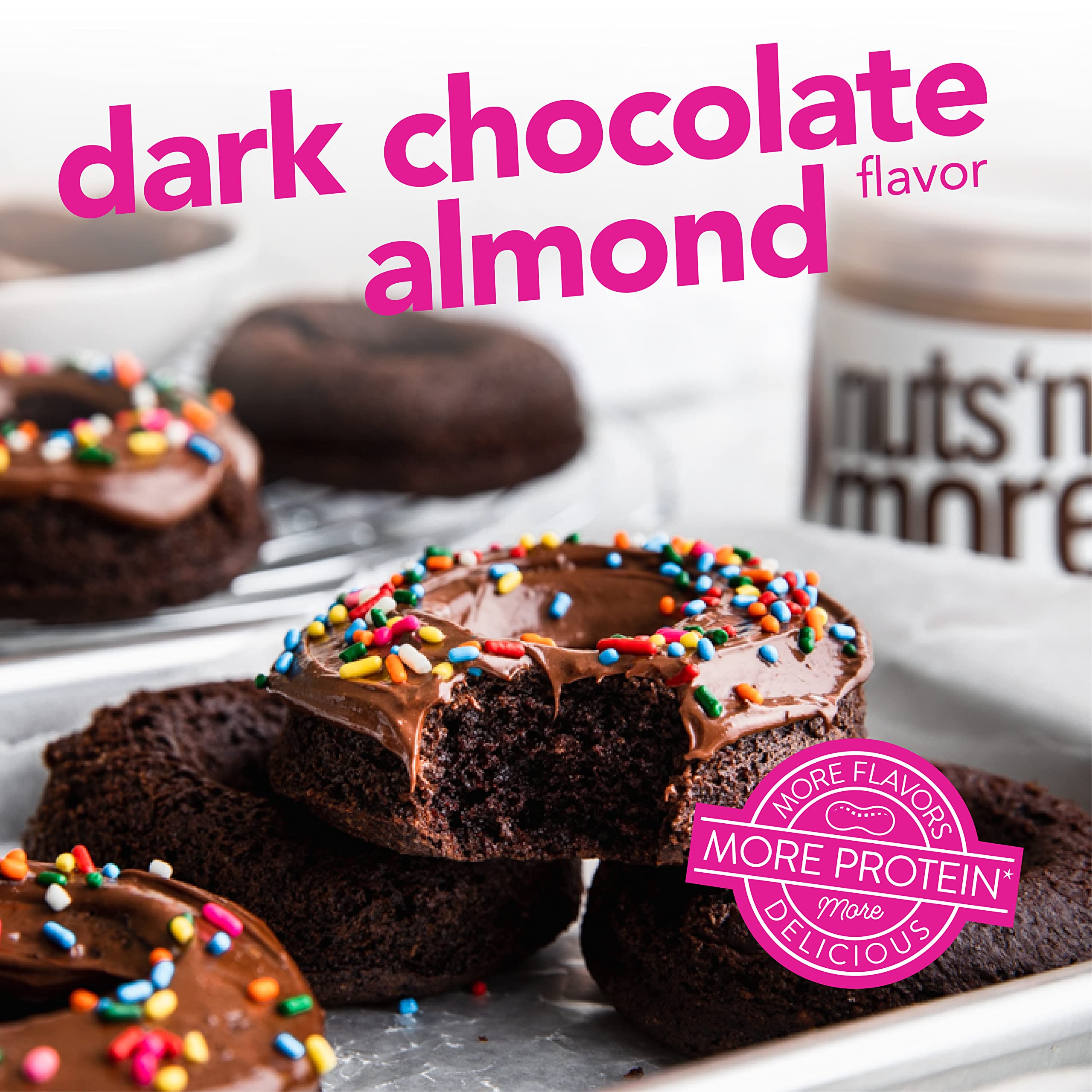 Spoon with Nuts 'N More Dark Chocolate Almond Butter Spread for a quick protein boost